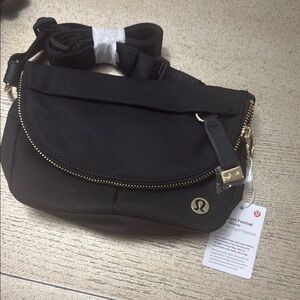 lululemon athletica Black Crossbody Bag with Zipper Closure and Sturdy Fabric